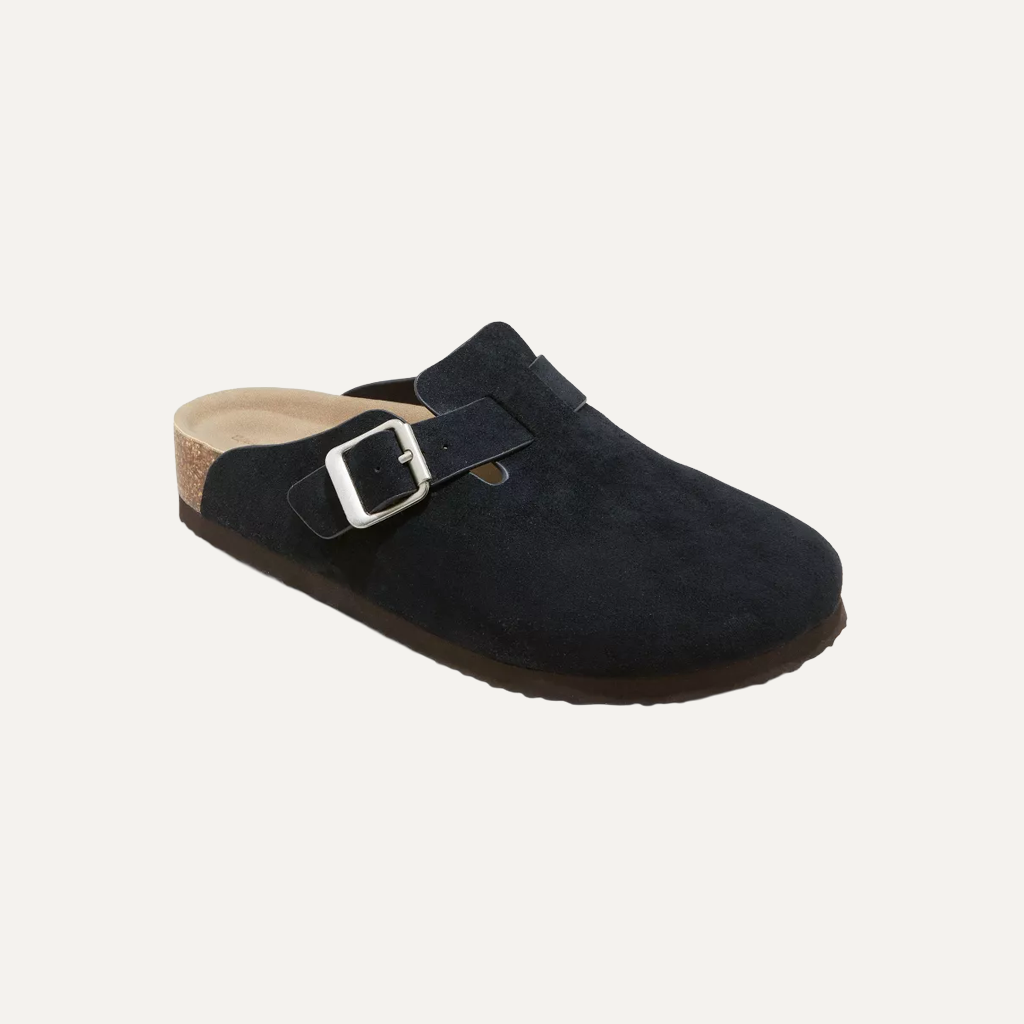 black cloggs on a white background