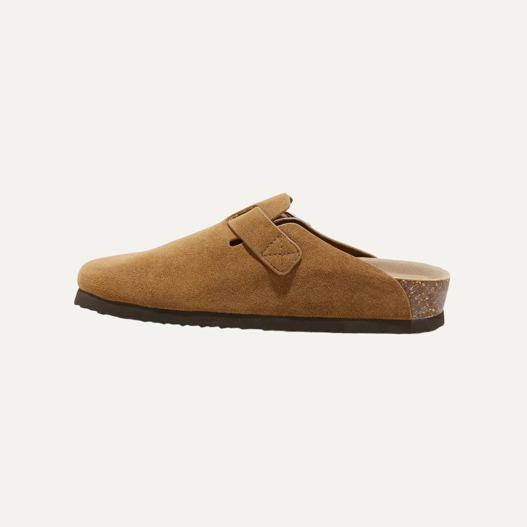 khaki cloggs on a white background