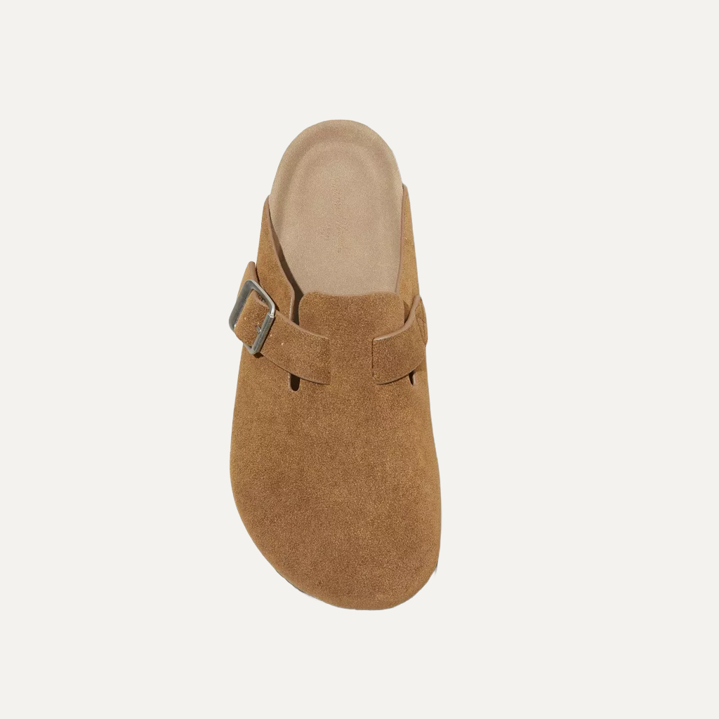 khaki cloggs on a white background