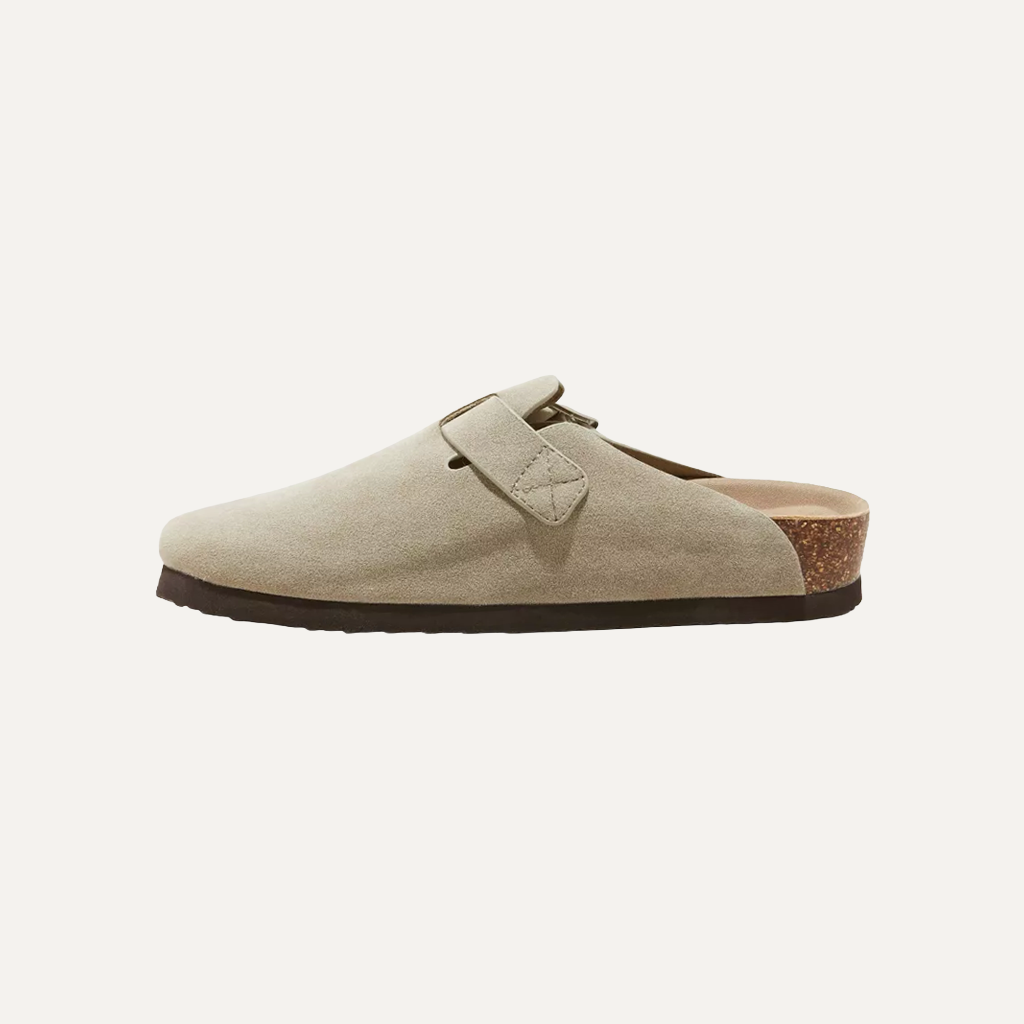 taupe cloggs on a white background