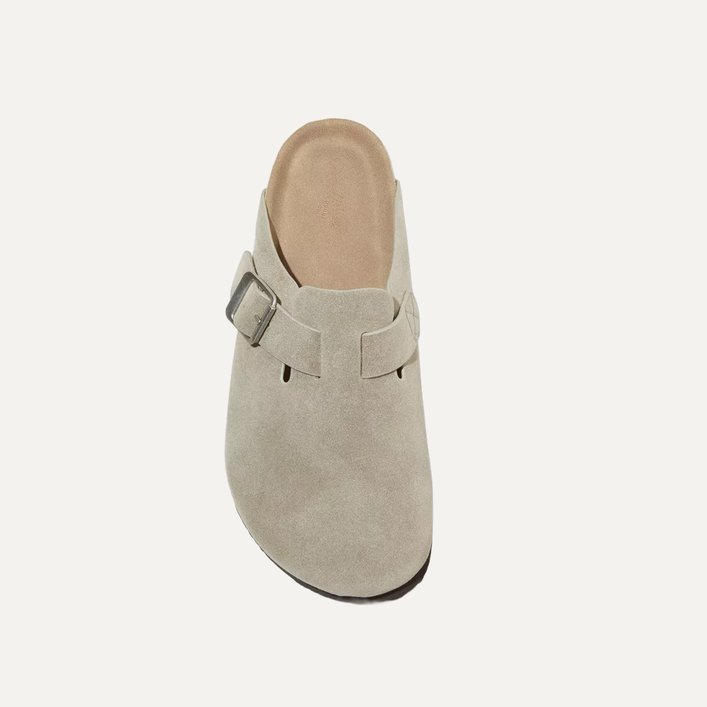 taupe cloggs on a white background