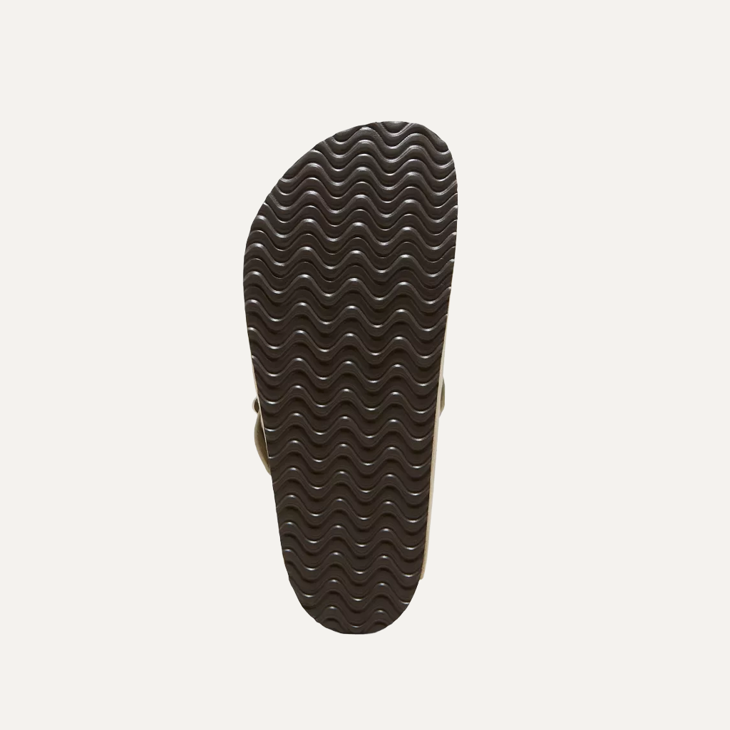 foot sole of a pair of cloggs on a white background